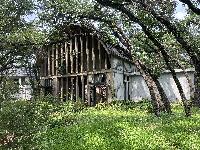 Interesting home - built in the late 60's, on 4 acres near 183/Duval.   
