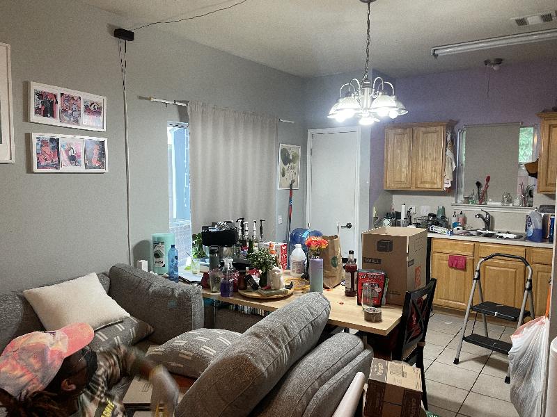 Living room, looking into kitchen 
